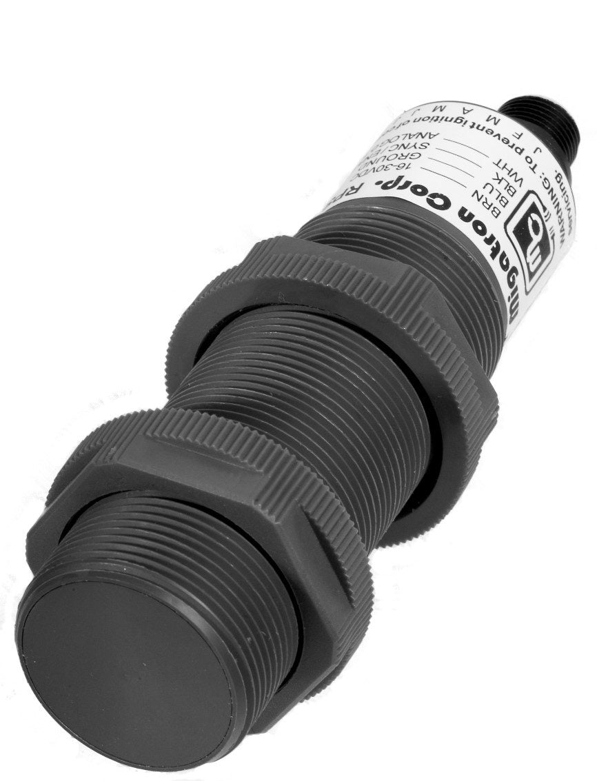 Close-up of a Migatron RPS-429A-IS2 Intrinsically Safe Analog Ultrasonic Sensor, featuring a cylindrical black plastic threaded body, white label, and 4-20mA output.