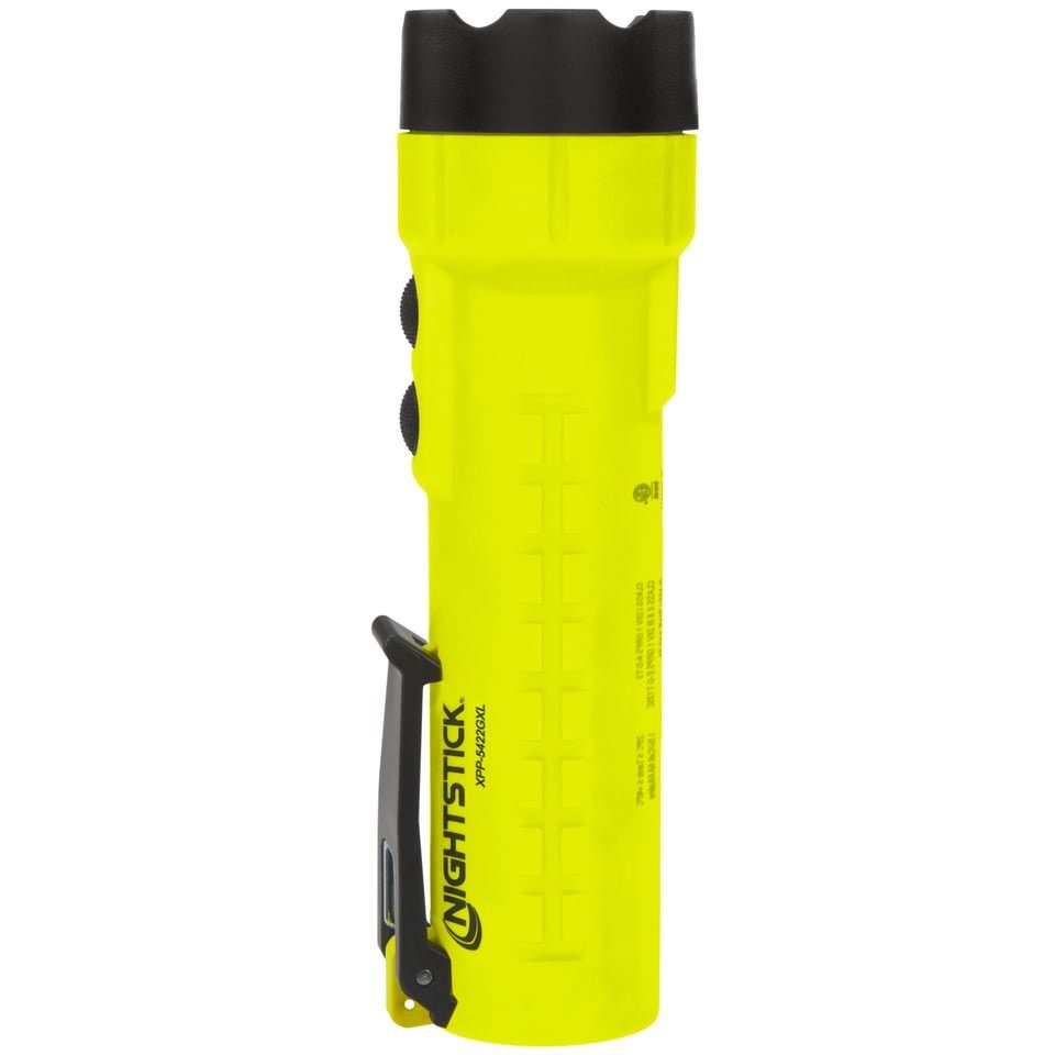 The Nightstick XPP-5422GXL Intrinsically Safe Flashlight w/Green Laser, featuring a yellow body, black clip, buttons, and top, stands upright against a white background—ideal for hazardous locations.