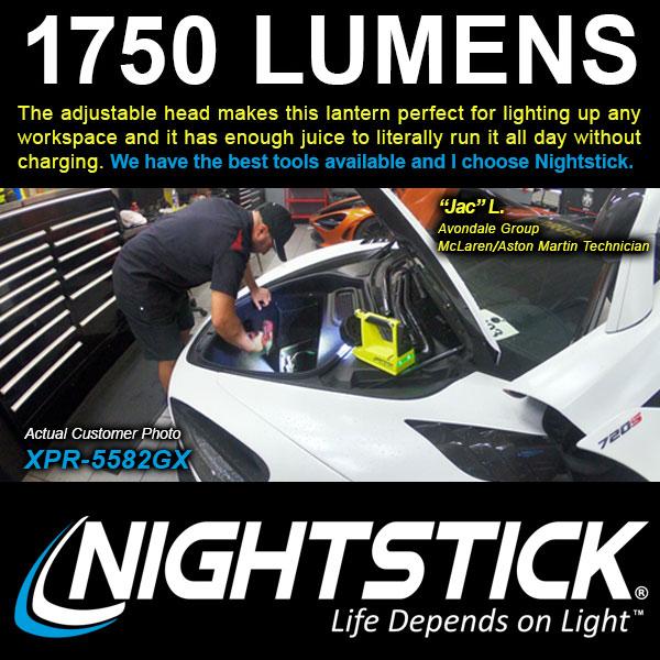 Someone uses a Nightstick XPR-5582GX 82 Intrinsically Safe Rechargeable Lantern with a lithium-ion battery to light up the engine bay of a white sports car in a garage. The 1750-lumen brightness is featured in the text.