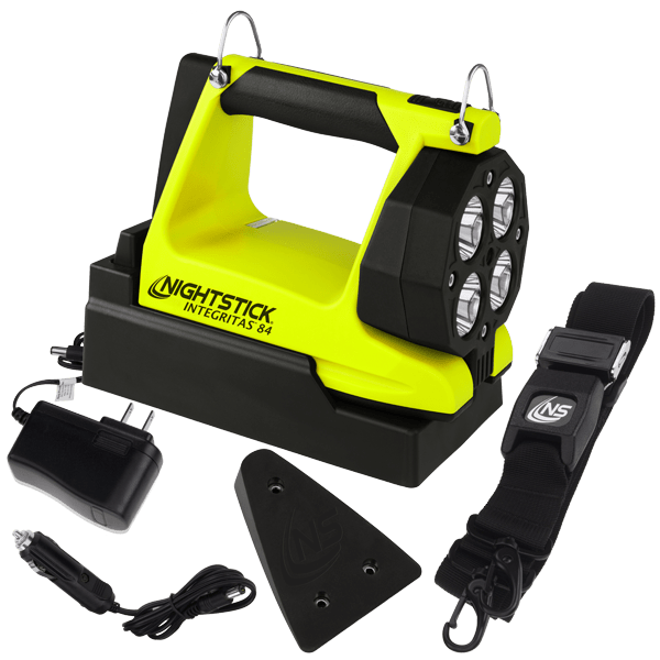 A yellow and black Nightstick XPR-5584GMX INTEGRITAS™ Intrinsically Safe Rechargeable Lantern with LED, magnetic base, charger, power adapter, shoulder strap, and mounting bracket shown on a white background.