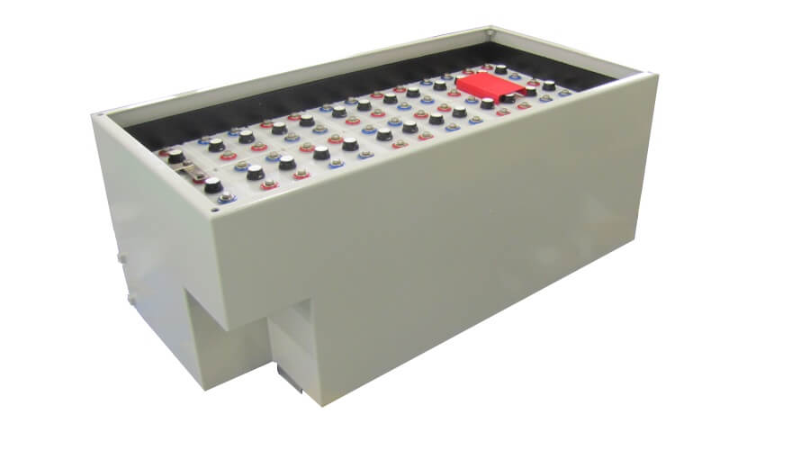 The Extronics iBATT5xx Zone 1 and 2 Stainless-Steel Universal Battery Enclosure, ATEX certified for hazardous areas, is a large rectangular unit with multiple terminal posts and a single red top cover, shown on a white background.