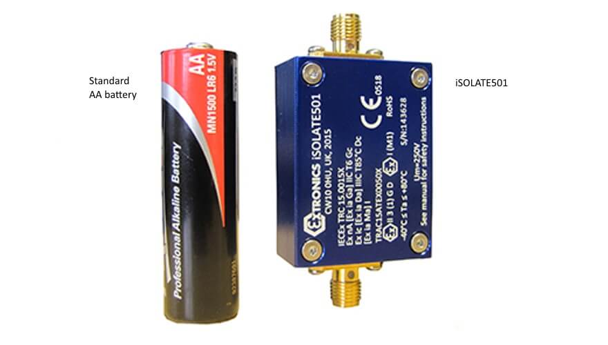 A standard AA battery is shown beside the Extronics iSOLATE501 RF Galvanically Isolated Intrinsically Safe Barrier, showing its compact size—ideal for ATEX Zone 0 certified intrinsically safe radios.