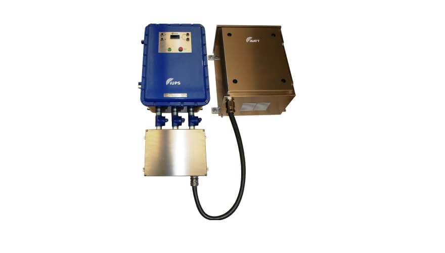 A blue and a brown Extronics iUPS101 Zone 1 and 2 Uninterruptible Power Supply, IECEx certified, are connected by a black cable and mounted against a white background.