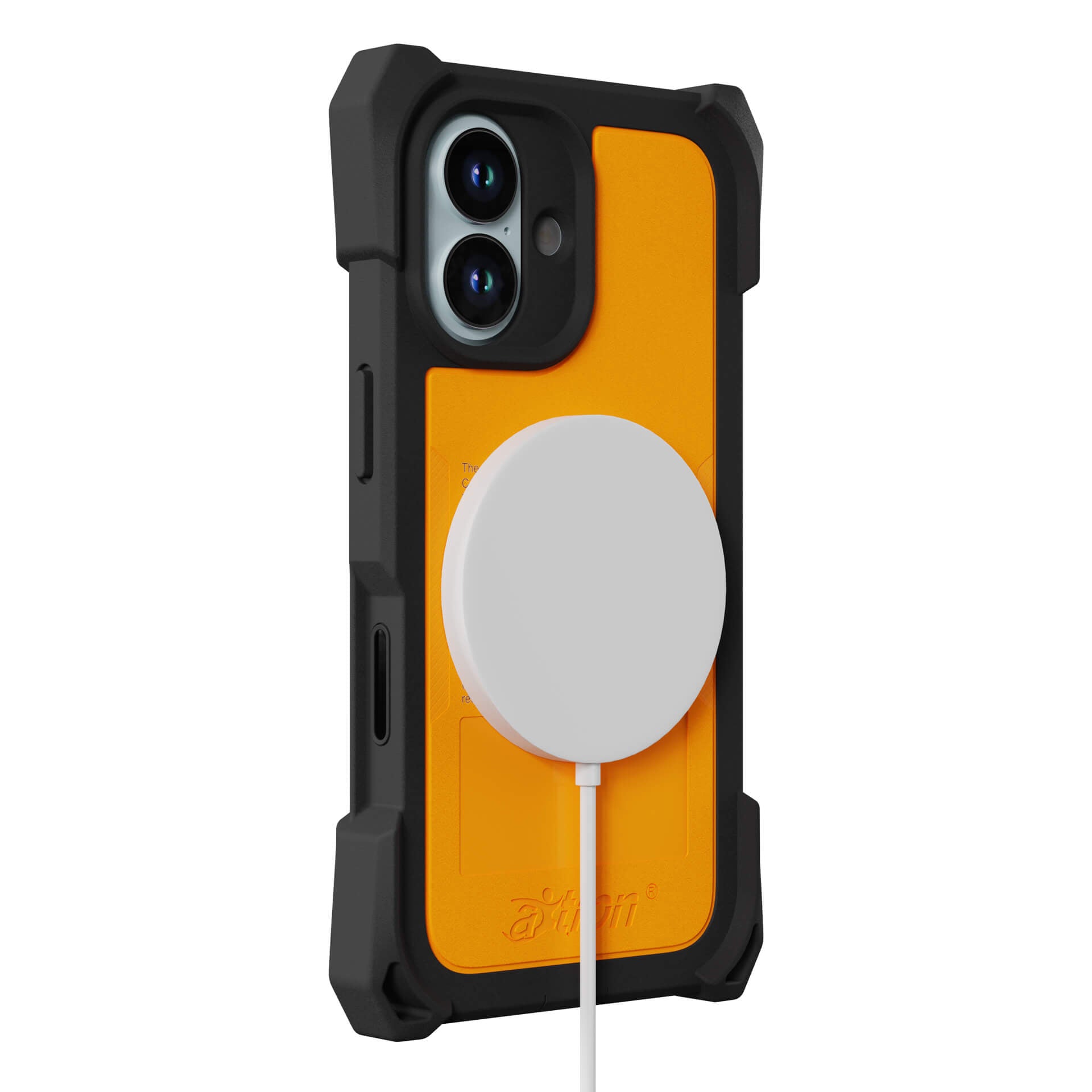 The Joy Factory aXtion Extreme Case for iPhone 17 is a rugged black and orange MIL-STD-810H certified case with a circular wireless charger attached to the back.