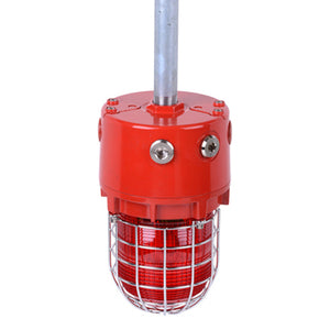 The E2S D1xB2X21 Explosion Proof Xenon Strobe Beacon 21J is a red industrial alarm light with a metal cage and marine-grade aluminium enclosure, mounted on a vertical pole.