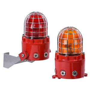 Two E2S D1xB2X05 Explosion Proof Xenon Strobe Beacons (5J)—one with a red lens, one amber—featuring red bases in marine-grade aluminium enclosures, are both protected by metal cages.