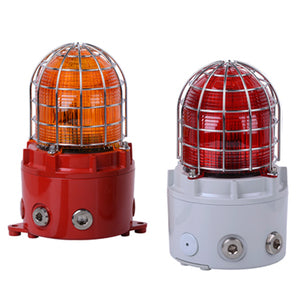 Two E2S D1xB2X10 Explosion Proof Xenon Strobe Beacons 10J, one with amber lens/red base and one with red lens/white base, are displayed side by side in a UL Marine approved marine grade aluminum enclosure with metal protective cages.