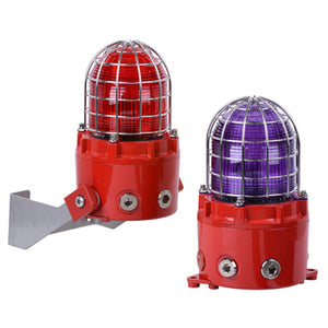 Two E2S D1xB2X10 Explosion Proof Xenon Strobe Beacons, red base, marine grade aluminum housing, metal guard cages; one red, one purple lens. One mounts on a bracket; the other rests flat.