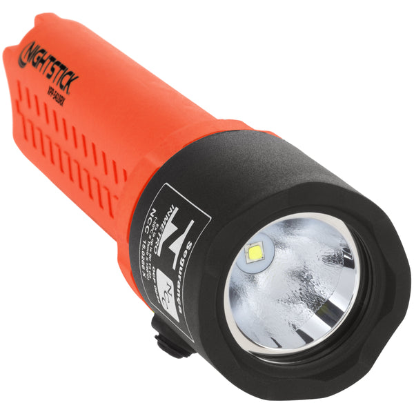 A close-up of the Nightstick XPP-5418RX [Zone 0] IS Flashlight—an intrinsically safe red and black LED flashlight with a textured grip, powered by 3 AA batteries.