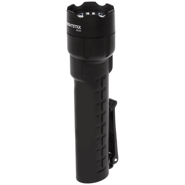 A black, heavy-duty Nightstick XPP-5420B [UL-913] IS Permissible LED flashlight with textured grip and side clip stands upright on a white background. "NIGHTSTICK" is printed near the top. It’s IP-67 waterproof for reliability in any conditions.