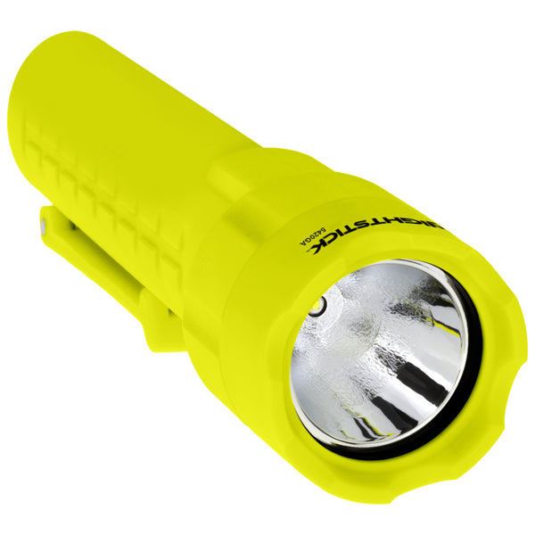 The Nightstick XPP-5420G [UL-913] IS Permissible Flashlight is a yellow handheld LED flashlight featuring a textured grip and reflective lens, shown from an angle highlighting its front and side.