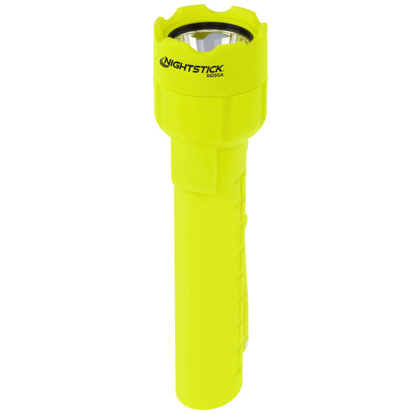 The Nightstick XPP-5420G [UL-913] IS Permissible Flashlight is displayed upright, featuring a yellow body with a textured grip and a round lens at the top.