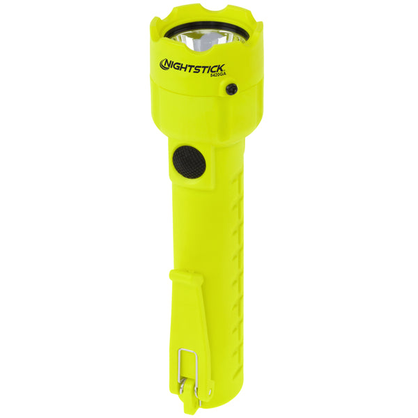 A Nightstick XPP-5420G [UL-913] IS Permissible yellow LED flashlight with a black button and side clip stands upright on a white background.