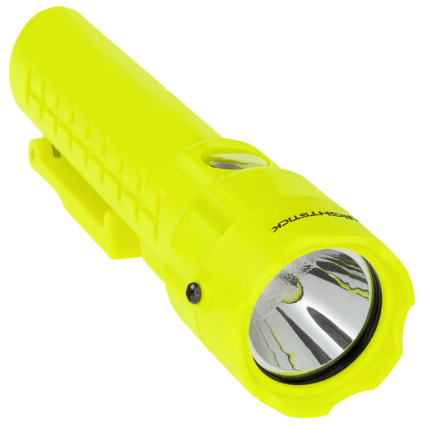 The Nightstick XPP-5422GM [UL-913] IS Permissible Dual-Light Flashlight w/Dual Magnets is a bright yellow waterproof flashlight with a textured grip and a reflective cone around the bulb, shown from an angle.