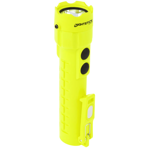 The Nightstick XPP-5422GM [UL-913] IS Permissible Dual-Light Flashlight with dual magnets, yellow body, side clip, and two black buttons is shown standing upright on a white background.