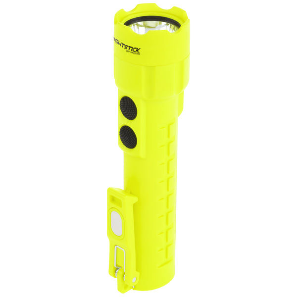 The Nightstick XPP-5422GM [UL-913] IS Permissible Dual-Light Flashlight features a yellow handheld design, dual LEDs, two side black buttons, a clip, and dual magnets for versatile attachment options.