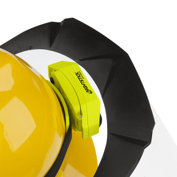 The Nightstick XPP-5460GX [Zone 0] IS Low-Profile Dual-Light Headlamp, in bright green, attaches securely to a hard hat or fire helmet for safe, reliable LED lighting.
